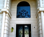 Iron Entry with Arched Window