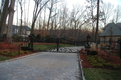 Iron entrance gate with posts